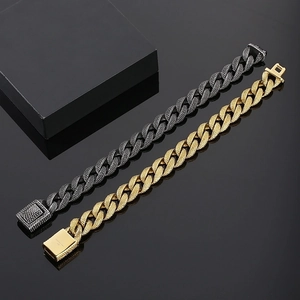 Detail of 316L stainless steel Cuban chain bracelet in gold and black silver finish