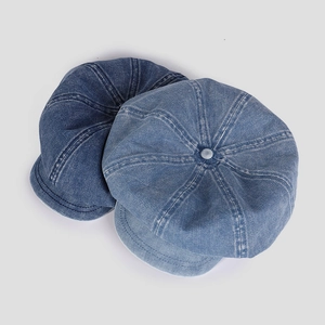 Classic oversized denim newsboy caps in light and dark blue wash for a slimming look