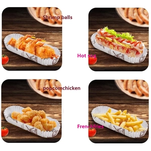Disposable paper food boats with windmill patterns holding fries and snacks