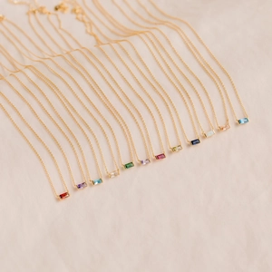 Golden titanium steel necklace set with 12 colorful birthstone baguette pendants