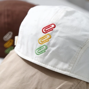 Kids cotton beret with colorful embroidered paperclips and stylish two-tone panel design