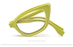 Detail view of foldable lime green cat eye sunglasses with high quality acetate frame