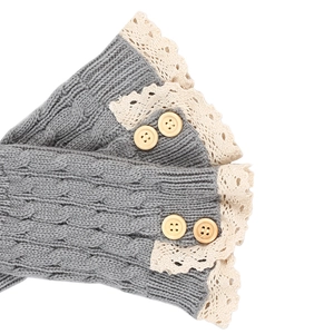 Grey cable knit leg warmers with beige lace trim and decorative wooden buttons