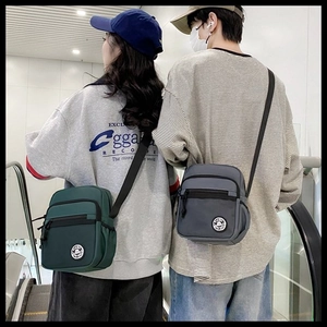 Detail showing high-density nylon messenger bags with adjustable straps in green and gray