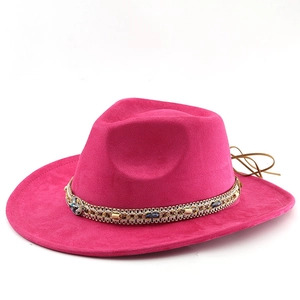 Detail of rose red fedora with bohemian metal braided band and turquoise bead accents