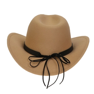 Close-up of khaki felt cowboy hat featuring a black belt and long fringe decorative detail