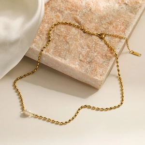 Minimalist 18K gold plated bead necklace featuring a natural baroque pearl pendant