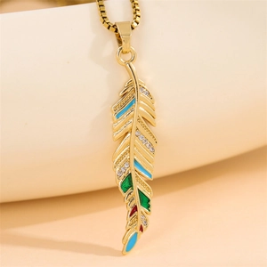 Gold leaf feather pendant necklace with colorful enamel and sparkling crystal accents