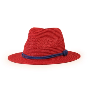 Detailed close-up of the red straw fedora featuring a decorative navy blue woven rope band