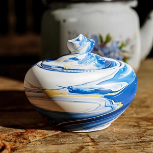 Macro shot of blue marble pattern silicone tea pot mold with elegant lid texture