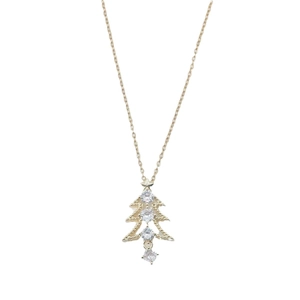 Gold hollow Christmas tree pendant necklace with sparkling zircons on a delicate chain