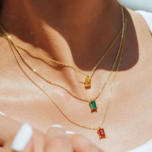 Three-layer gold stainless steel necklace with square colorful zircon pendants worn by model