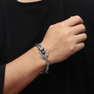 Silver stainless steel dragon bracelet for men featuring detailed dragon head and claws