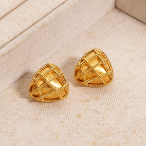 Detail view of gold triangular earrings featuring a braided metal mesh texture and finish