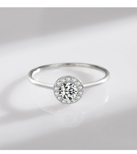 Macro view of S925 sterling silver ring with halo-set round cubic zirconia stone