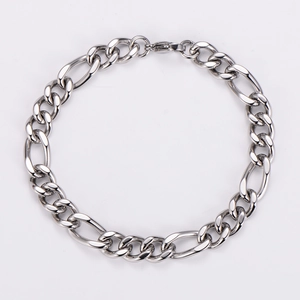 Detailed macro view of 8mm Figaro link stainless steel bracelet with lobster clasp