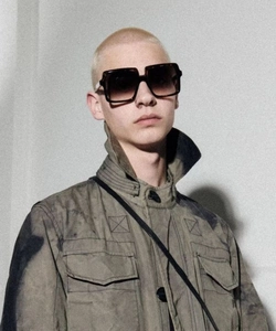 Fashionable oversized square sunglasses with gradient lenses shown on a model