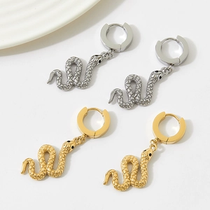 Chic snake pendant earrings in gold and silver finish with textured scales and rings
