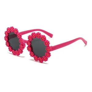 Chic daisy flower sunglasses for girls with pink frames and dark UV protection lenses