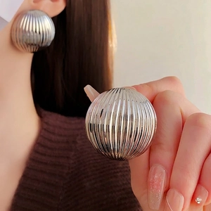 Polished silver striped round metal stud earrings with elegant vertical texture