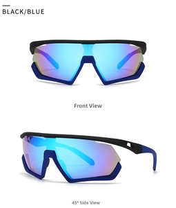 Detail of oversized retro sunglasses with blue mirrored lenses and black blue frame