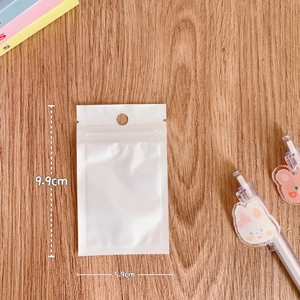 Measurement of 5.9x9.9cm white translucent jewelry storage bag with hang hole