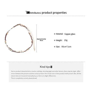 Detail view of 3-piece beaded waist chain set with specs showing copper and glass materials
