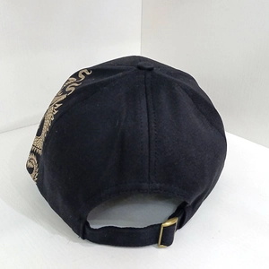 Black cotton baseball cap with gold dragon embroidery and metal adjustable back buckle