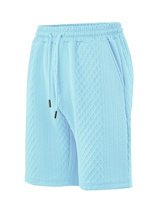 Detail of light blue waffle knit texture and drawstring on men's casual shorts