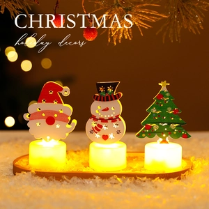 Three Christmas LED candle lanterns with Santa, Snowman, and Tree designs for holiday decor