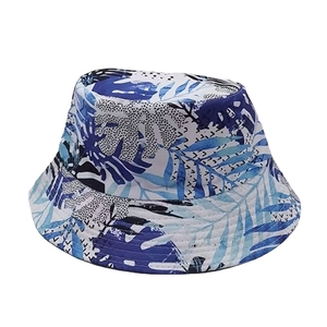 Double-sided sun hat with tropical leaf print in blue and white, stylish summer bucket hat