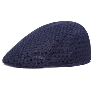 Close-up of the breathable mesh texture on this navy blue summer flat cap for men