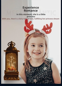 Detail of vintage Christmas lantern with Santa scene and girl celebrating holiday