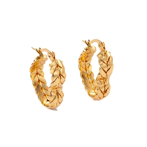Detailed view of golden woven twist pattern on stainless steel hoop earrings