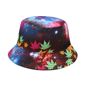 Detail of colorful galaxy and maple leaf print on reversible fisherman bucket hat