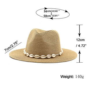Detailed view of straw jazz hat with natural shells band and dimensions measurement
