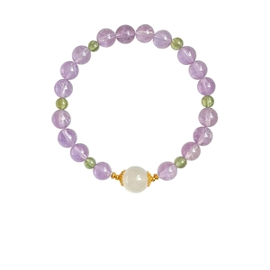 Natural amethyst and green stone beaded bracelet with a large white bead and gold accents