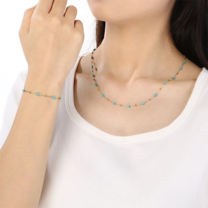 Minimalist gold chain necklace and bracelet set with blue turquoise glass beads for women