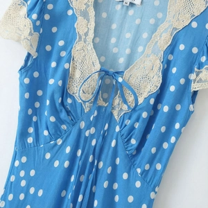Blue polka dot French vintage dress with white lace trim and V-neck tie detail