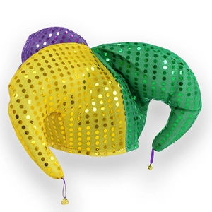 Close-up of Mardi Gras jester hat with sequins and golden bells on horn tips