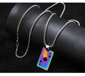 Close-up of rainbow stainless steel playing card pendant with Ace of Spades on silver chain