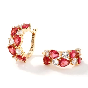 Elegant gold hoop earrings featuring vibrant red and white teardrop crystal pendants