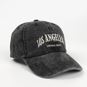 Detail of vintage washed charcoal baseball cap with white LOS ANGELES embroidery