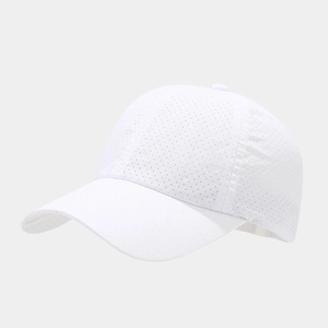 Close-up of laser-cut breathable holes on white quick-dry sports baseball cap fabric