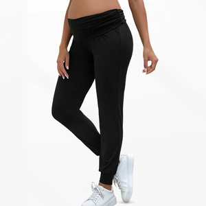 High-waist maternity joggers in black with abdominal support and tapered leg design