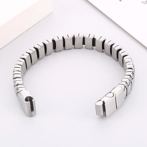 Close-up of vintage stainless steel men's bracelet with rectangular links and clasp