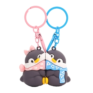 Cute penguin magnetic couple keychain set in pink and blue silicone for bag charms