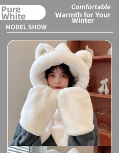 Detail of soft white plush hooded scarf with cute cat ears and AA letter embroidery