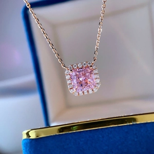 Pink square stone necklace in rose gold finish with halo crystals in luxury blue jewelry box