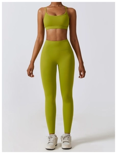 Detailed front view of women's lime green high-waisted yoga leggings and sports bra set